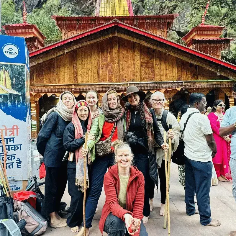 Close-up shot of clients with our local guide (Sunny) outside Yamunotri Dham temple, part of our 4 dham yatra package.