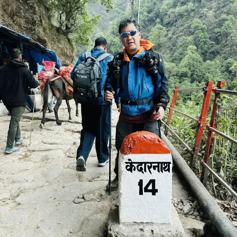 Happy clients at the 14km Kedarnath milestone image captured by our guide Sunny Dhiman during their Chardham yatra tour package .